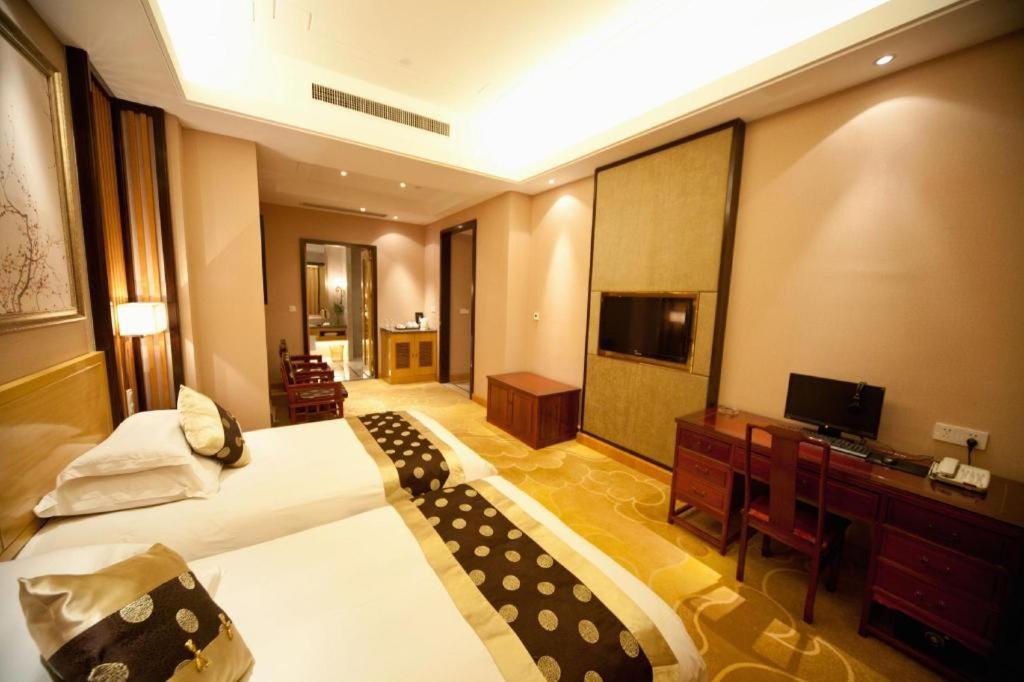 Feicheng Blossom Hotel Exterior foto