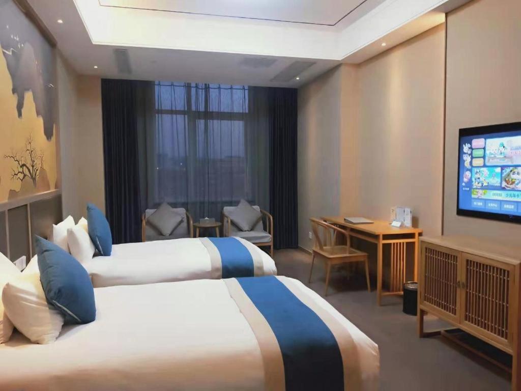 Feicheng Blossom Hotel Exterior foto